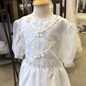 First communion, flower, girl, dress with sleeves, floral and ribbon accents